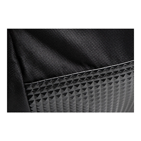 Gros plan d'une surface noire texturée avec un motif carré.