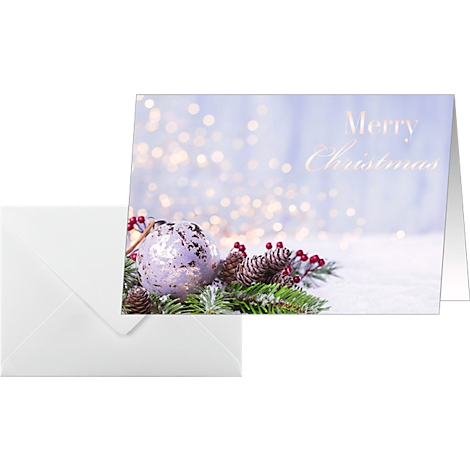 Kerstkaart met decoratie en envelop. Opschrift: Vrolijk Kerstfeest.