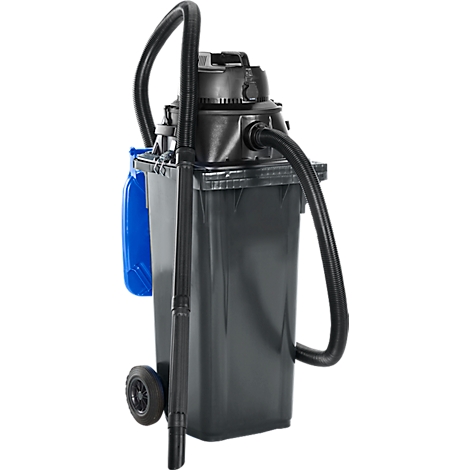 Aspirateur noir eau et poussière avec tuyau et roues, plan rapproché.
