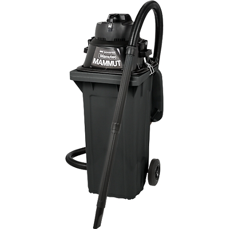 Aspirateur industriel noir sur un conteneur noir avec des roues. Le tuyau et le tuyau d'aspiration sont attachés. Inscription : Manutec Mammut.