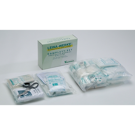 Kit de premiers secours Leina-Werke avec boîte et trois paquets de fournitures médicales emballés dans du plastique.