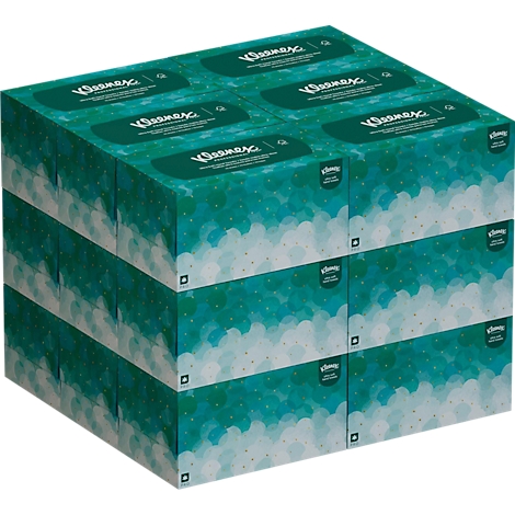 Zes pakken Kleenex tissues, gestapeld in drie rijen. De pakken zijn groen met witte wolkenpatronen en het Kleenex-logo.