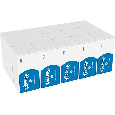 A stack of Kleenex boxes, labeled "Kleenex Large Hand Towels."