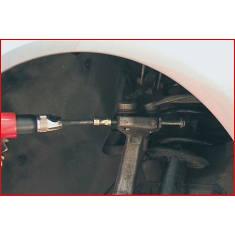 Werkzeug montiert an Fahrzeugaufhängung. Nahaufnahme, rote Werkzeugpistole.