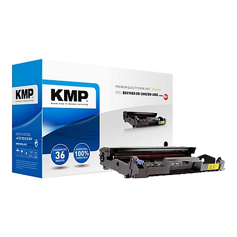 Eine Trommeleinheit von KMP vor einer Verpackung. Auf der Verpackung steht KMP und Brother DR-2000/DR-2005.