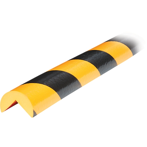 Yellow and black corner protector, formed as a semicircle.