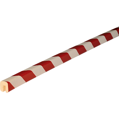 Rotes und weißes, gestreiftes Kantenschutzprofil, diagonal platziert.
