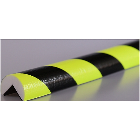 Marcador de advertencia negro y amarillo. El producto es semicircular y tiene rayas negras y amarillas alternas.