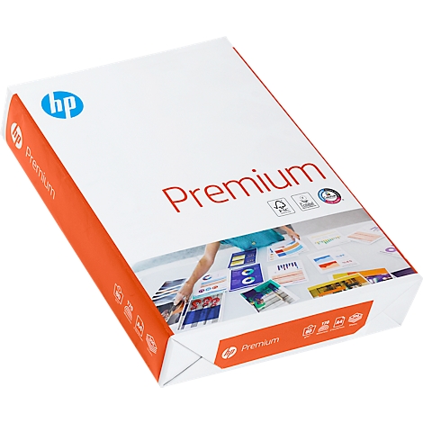 Een pakket HP Premium papier. Prints zijn zichtbaar: HP-logo, Premium, papiercertificeringen. Binnen: handen over stapels papier.