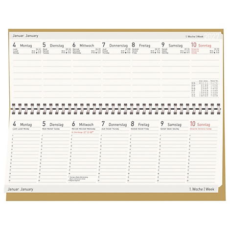 Un calendrier hebdomadaire ouvert avec une reliure à spirale. Le côté gauche montre les dates du lundi au mercredi, le côté droit du jeudi au dimanche.