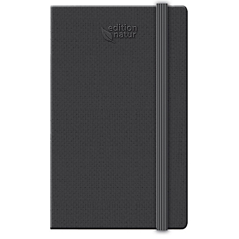 Un carnet noir avec un élastique. Le livre dit 'édition natur'.