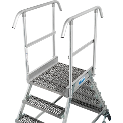 Aluminium trap met leuningen. Treden, platform, leuningen en het Krause-logo zijn zichtbaar.
