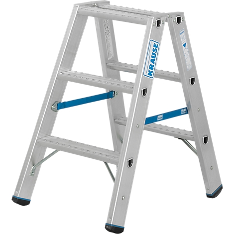 Zilveren trap met blauwe stutten en het 'Krause'-logo. De ladder staat stabiel op zwarte voeten.
