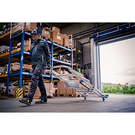 Detailaufnahme einer Leiter. Ein roter Verriegelungsmechanismus greift in die Sprossen ein.