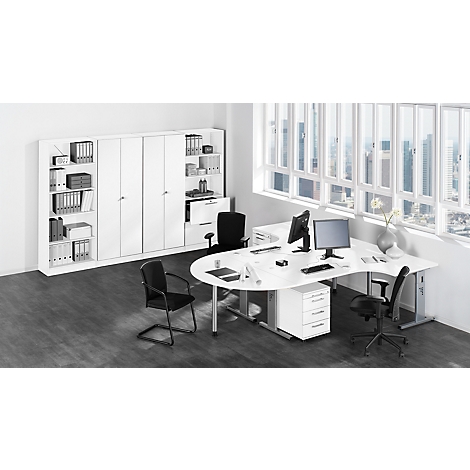 Modern office: white desk, black chairs, filing cabinets, windows with city view.