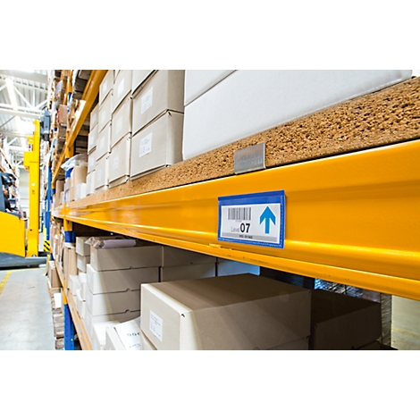Yellow shelves with boxes, shelf label with up arrow and number 07.