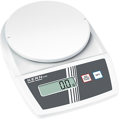 Digital scale with white housing, round weighing plate, grey display and buttons.