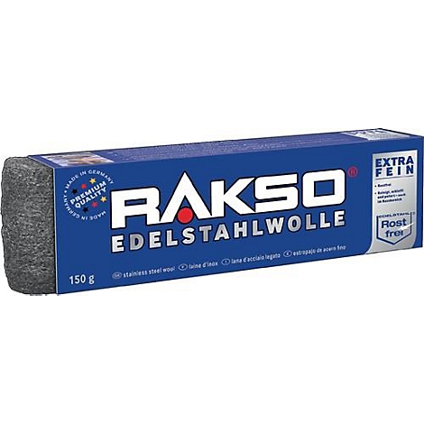 Emballage bleu avec "RAKSO EDELSTAHLWOLLE". Bloc de laine d'acier, logo de la marque et informations sur le produit imprimés.