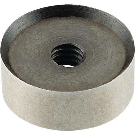 Gros plan d'un objet cylindrique métallique avec un trou taraudé au centre.