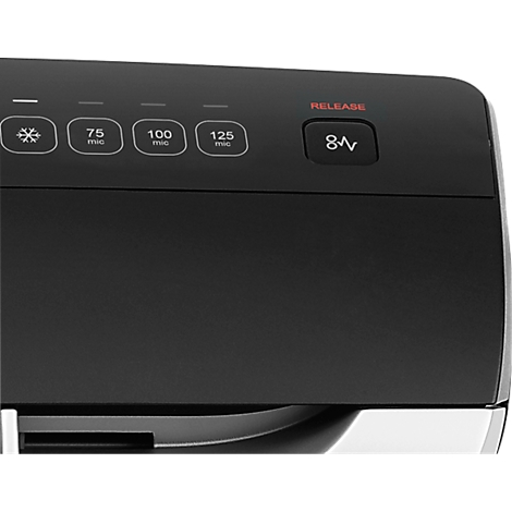 Detailed view of a black device with a control panel. Buttons display symbols and labels such as 'RELEASE' and '8V'.