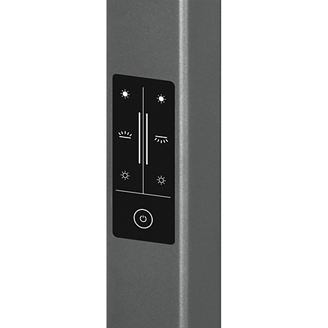 Gros plan d'un panneau de commande sur un objet gris. Symboles de lumière, de luminosité, marche/arrêt sur un champ noir.