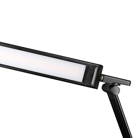 Une lampe de bureau noire. La tête de la lampe est rectangulaire et brille en blanc. L'articulation et le bras sont également noirs.