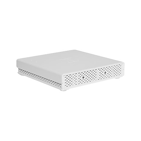 Appareil blanc et rectangulaire avec des bords arrondis et des côtés perforés. Le dessus est lisse. Il repose sur de petits pieds.