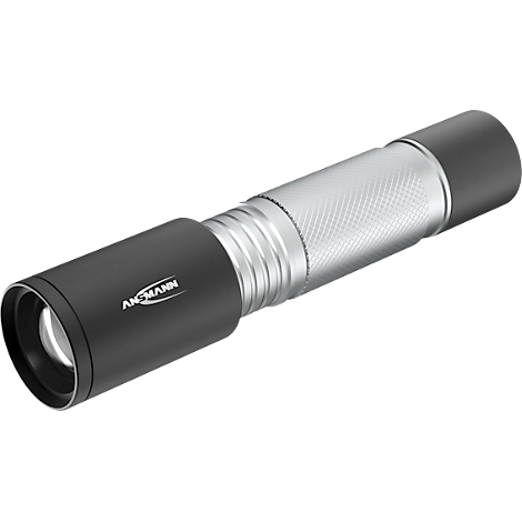 Black and silver flashlight with a knurled surface and logo. The lamp lies diagonally against a white background.