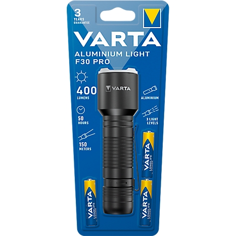 Black Varta Aluminium F30 Pro flashlight with yellow batteries. The packaging shows details such as lumens, operating time, and light range.