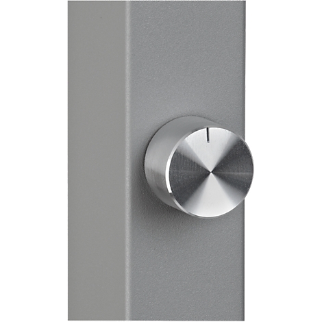 Gray metal volume control. The knob has a mark.
