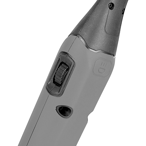 Gray device with rotary switch and LED symbol. Detailed shot.