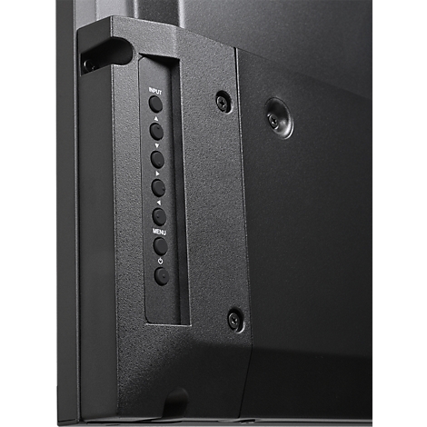 Close-up van de bedieningselementen van een tv. Serie knoppen waaronder input en menu.