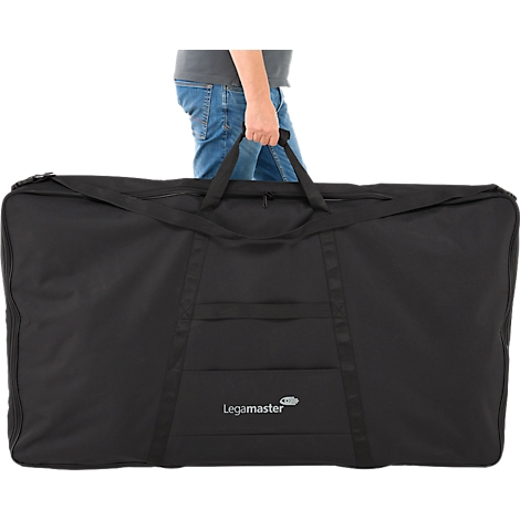 A person holds a large, black carrying bag with the "Legamaster" logo. The bag has handles and zippers.