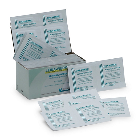 Une boîte ouverte de lingettes nettoyantes Lens Wipes, avec plusieurs lingettes emballées individuellement à côté.