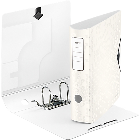 A white folder with floral pattern open on a table.