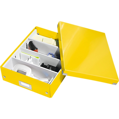 Yellow, open box with compartments, filled with office accessories, lid next to it.