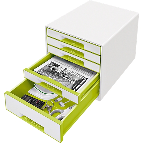 White drawer system with open green drawers. Contains a magazine, keys, remote control and office supplies.