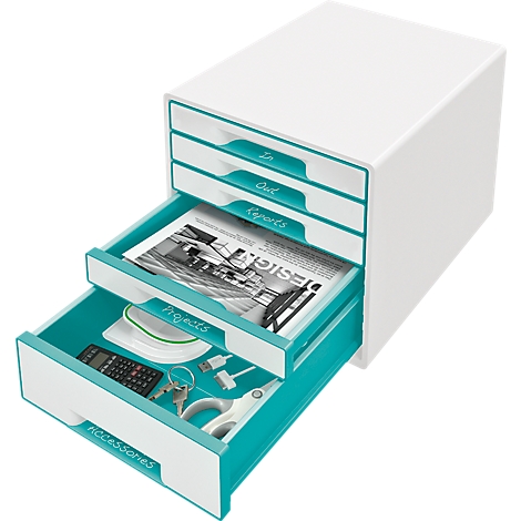 White office organizer with turquoise drawers and labels. Drawers open with contents like magazines and office supplies.