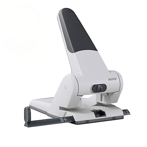 White and gray paper punch, Leitz brand. The handle is up.