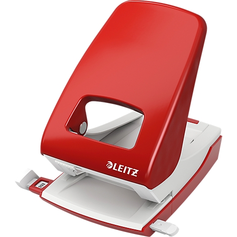 Red Leitz paper punch, top view. White base, red lever, recess in the middle. The brand name 'Leitz' is on the right.