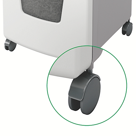 Close-up of a caster wheel of a white and gray device.