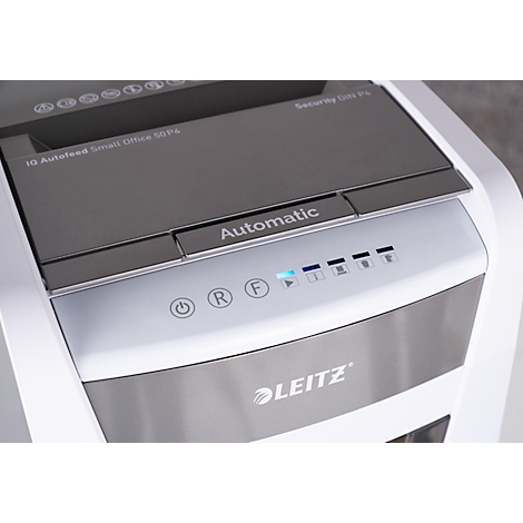 Close-up of a white paper shredder. The control panel is labeled and lit up. The Leitz logo is visible.