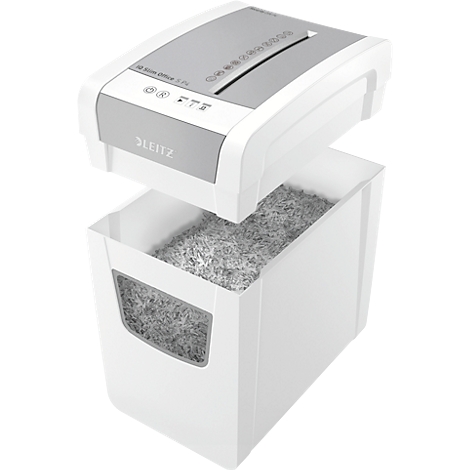 Versnipperaar met open opvangbak. Grijs versnipperd papier. Leitz merk.