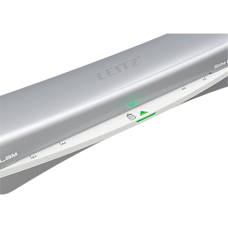 Close-up of a gray Leitz laminator. A green light and a pictogram are visible on the control panel.