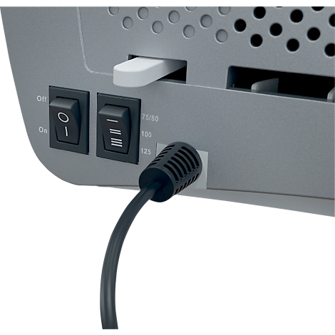 Close-up of the back of a gray device with on/off switches, a white slider, and a power cable.