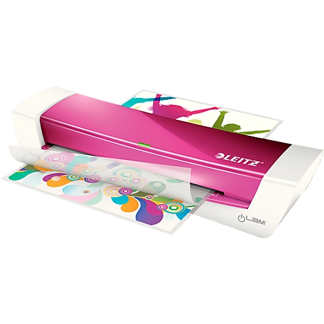 A pink LEITZ laminator. Two sheets of paper with colorful prints are being laminated.