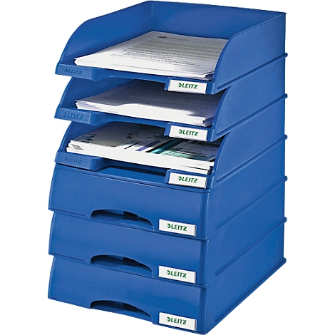 Blue LEITZ file tray, four compartments with papers. Each compartment has a LEITZ label.