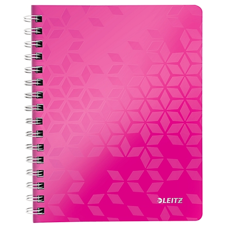 Ein pinkfarbenes Notizbuch mit Spirale und geometrischem Muster.