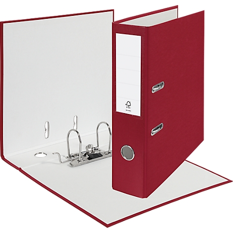 An open, red binder with white interior, metal mechanism, and label field.