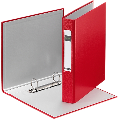 A red binder, opened and slightly angled. The binder has a white label and silver rings.
